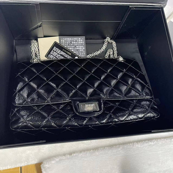 Chanel/CC Reissue 2.55 Black Flap Bag